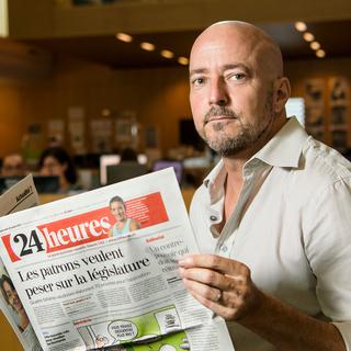 Portrait de Claude Ansermoz, rédacteur en chef du journal 24heures. [Keystone - Jean-Christophe Bott]