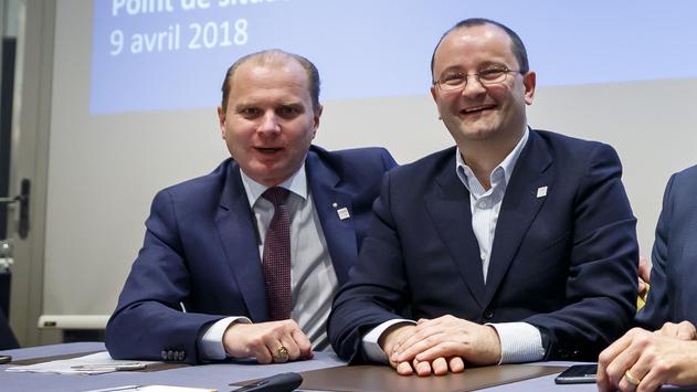 Philippe Leuba, conseiller d’Etat vaudois et vice-président du comite d’organisation de Lausanne 2020 et Patrick Baumann, président du comite d’organisation. [Keystone - Valentin Flauraud]