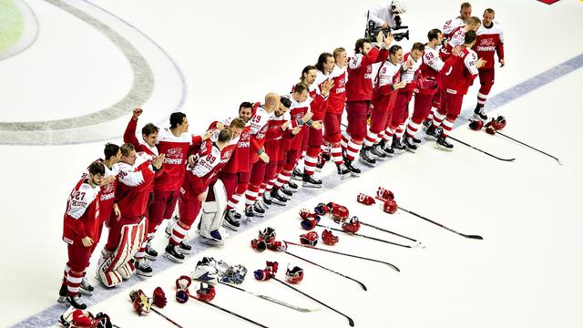 Les joueurs du Danemark célèbrent leur victoire importante contre les Norvègiens. [Henning Bagger]