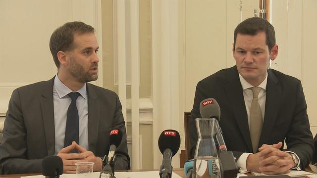 Le vice-président du Conseil d'Etat Antonio Hodgers et le président Pierre Maudet, lors d'un point presse le 5 septembre 2018. [RTS]