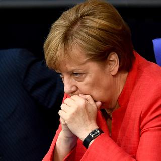 La chancelière allemande Angela Merkel au Parlement allemand le 4 juillet. [Keystone/EPA - Filip Singer]