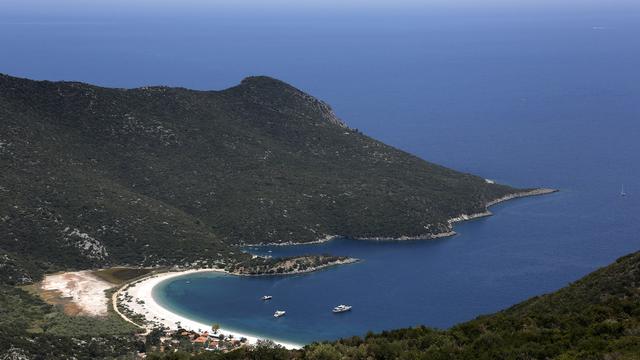 Les touristes étrangers investissent en Grèce, après huit ans d'austérité. [Reuters - Yannis Behrakis]