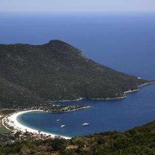 Les touristes étrangers investissent en Grèce, après huit ans d'austérité. [Reuters - Yannis Behrakis]