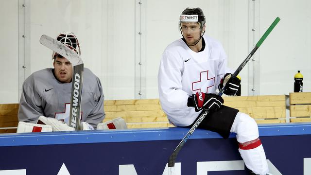 Reto Berra (à g.) et Nino Niederreiter évoluent tous deux en NHL. [Salvatore Di Nolfi]