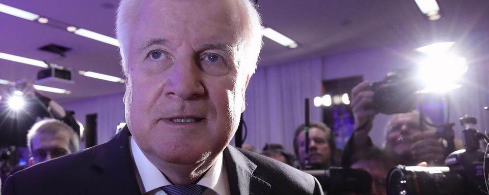 Le ministre de l'Intérieur allemand et président de la CSU Horst Seehofer au soir de l'élection. [Keystone/DPA - Michel Kappeler]