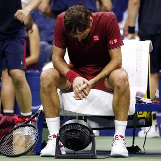 Federer a souffert de la chaleur et de l'humidité régnant à Flushing Meadows. [AP/Keystone - Jason DeCrow]