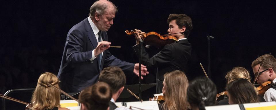 Le chef d'orchestre Valery Gergiev et le violoniste Daniel Lozakovich lors du concert d'ouverture du Verbier Festival 2018. [Verbier Festival - Nicolas Brodard]