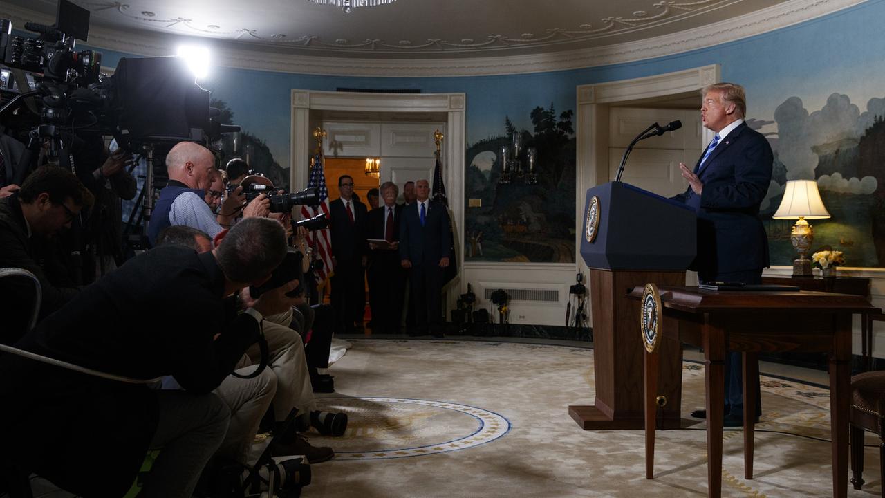 Donald Trump au moment de l'annonce du retrait américain de l'accord sur le nucléaire iranien. [Keystone - AP/Evan Vucci]