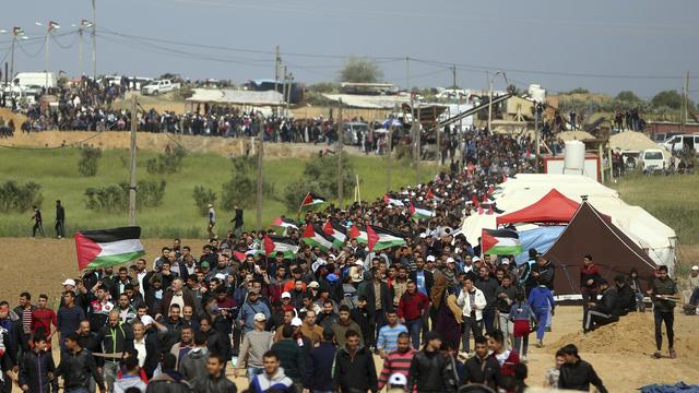 Les manifestants rassemblés pour réclamer le retour des réfugiés palestiniens en Israël. [Keystone - AP Photo/ Khalil Hamra]