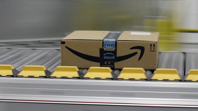 Le géant américain Amazon s'est associé avec La Poste pour intégrer le marché suisse. [AP/Keystone - Rich Pedroncelli]