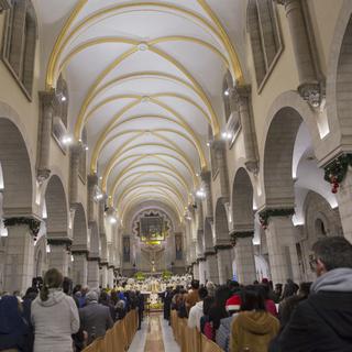 La messe de Noël dans la basilique de la Nativité, à Bethléem. [Keystone - AP Photo - Nasser Nasser]