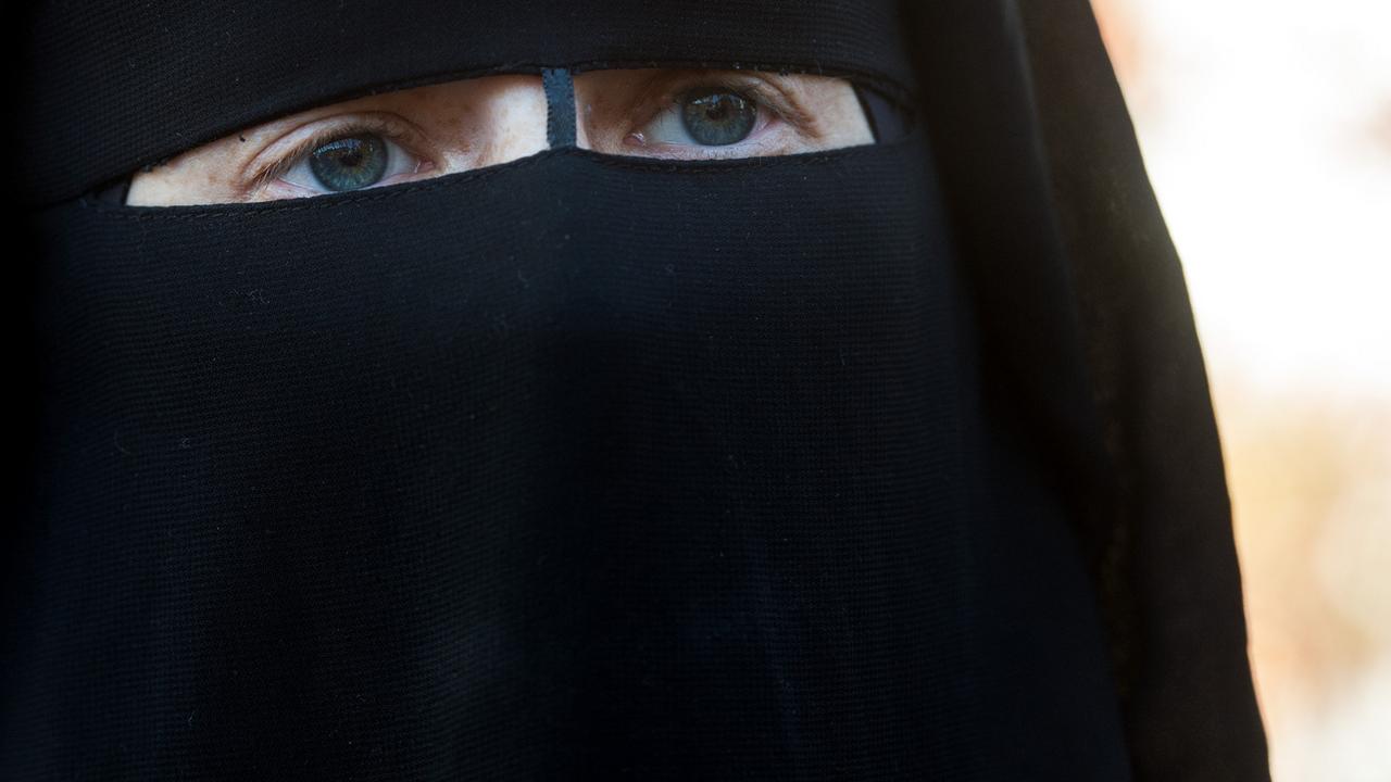 Une femme portant la burqa. [Ti-Press/Keystone - Gabriele Putzu]