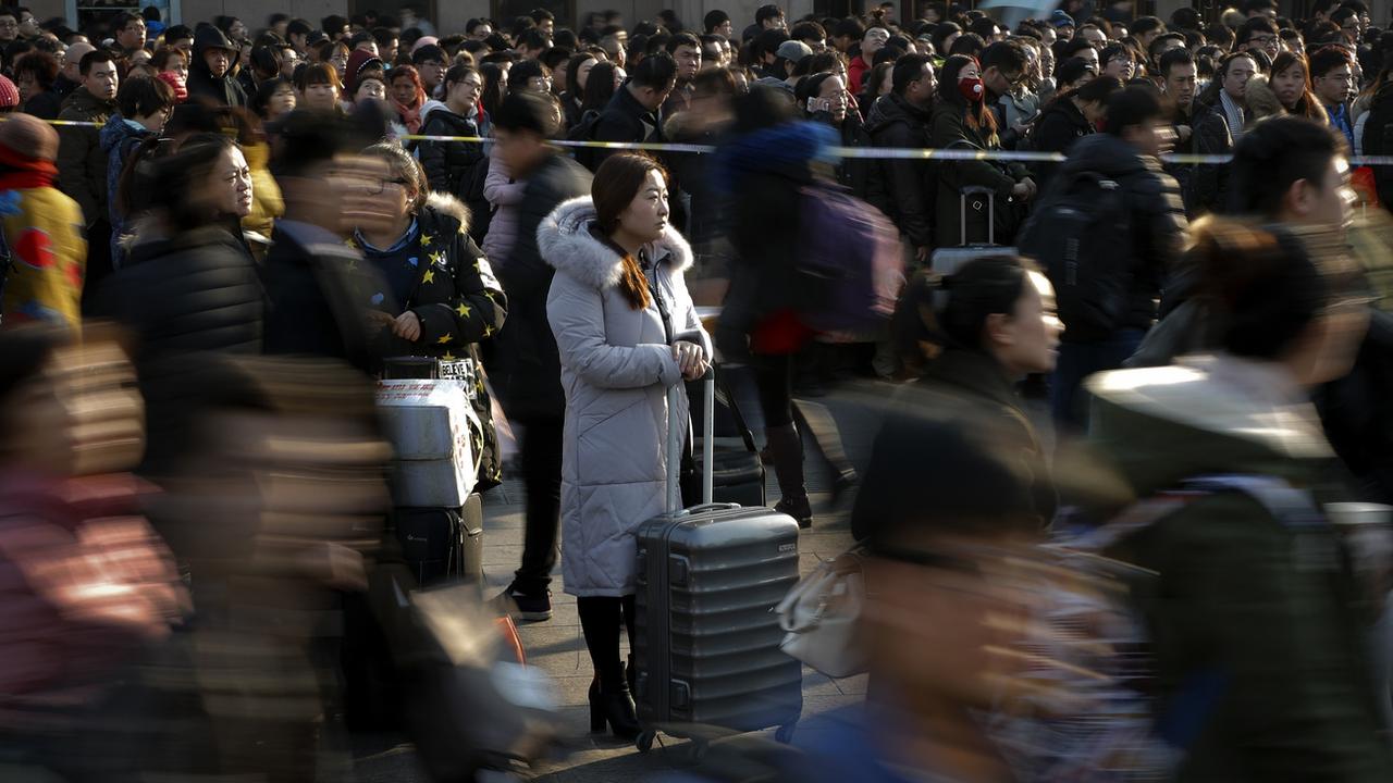 Les autorités chinoises vont évaluer les citoyens en fonction de leur comportement. [AP Photo / Keystone - Andy Wong]