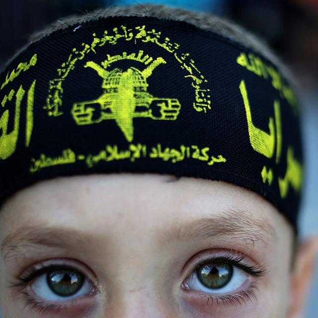 Jeune garçon palestinien portant un bandeau du "Djihad islamique", camp de réfugiés de Jabaliya, bande de Gaza, 26 septembre 2013. [Keystone - Mohammed Saber]