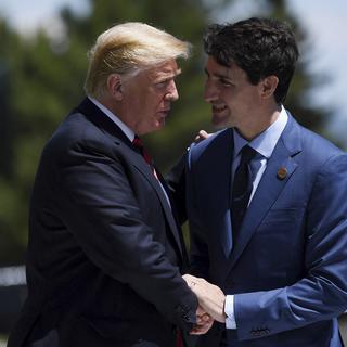 Donald Trump et Justin Trudeau. [EPA/Keystone - Neil Hall]