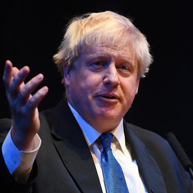 Le plan sur le Brexit "est dangereux", a déclaré Boris Johnson devant les délégués du parti conservateur. [Keystone - EPA/Neil Hall]