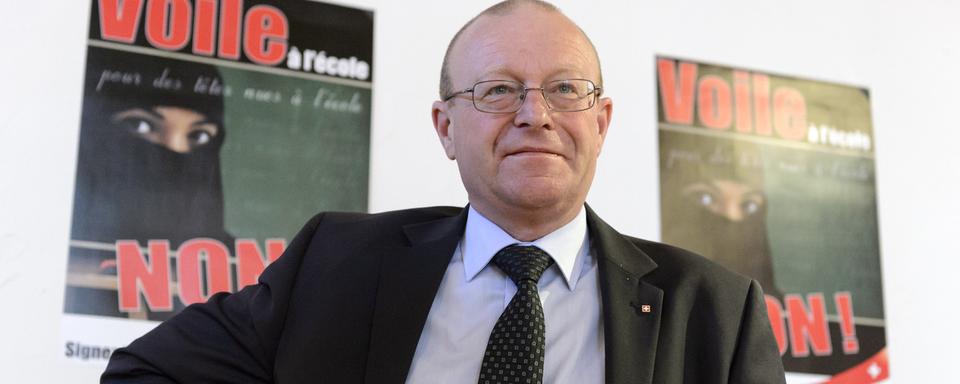 Jean-Luc Addor, co-président du comite de l'initiative de l'UDC, "pour des élèves tête nue dans les écoles valaisannes". [Keystone - Laurent Gillieron]