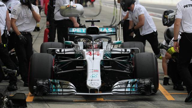 Hamilton s'élancera de la 1re ligne en compagnie de son coéquipier Valtteri Bottas. [Keystone - Franck Robichon]