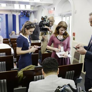 Des journalistes dans la briefing room de la Maison Blanche. [Keystone - Olivier Douliery]