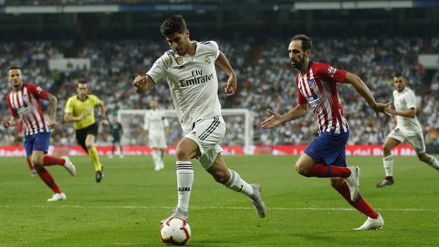 L'attaquant du Real Marco Asensio n'a pas trouvé la faille face à l'Atlético. [Keystone - Paul White]