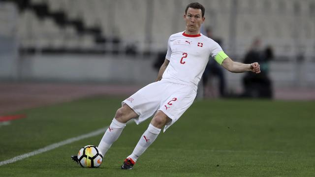 Le capitaine de l'équipe de Suisse, Stephan Lichtsteiner, lors du match contre la Grèce, vendredi 23 mars. [Keystone - Thanassis Stavrakis - AP Photo]