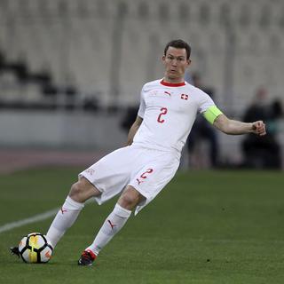 Le capitaine de l'équipe de Suisse, Stephan Lichtsteiner, lors du match contre la Grèce, vendredi 23 mars. [Keystone - Thanassis Stavrakis - AP Photo]
