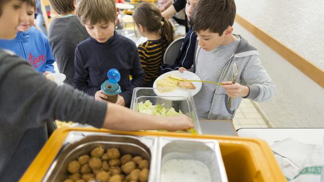 Une pétition a été lancée contre l'accueil parascolaire des élèves en primaire dans le canton de Vaud. [Keystone - Gaetan Bally]