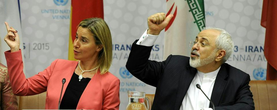 Federica Mogherini veut tout faire pour préserver l'accord (ici avec Mohammad Javad Zarif en avril 2015). [EPA/Keystone - Herbert Neubauer]