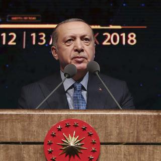 Le président turc Recep Tayyip Erdogan a annoncé mercredi une offensive contre les Kurdes en Syrie. [Presidential Press Service via AP]