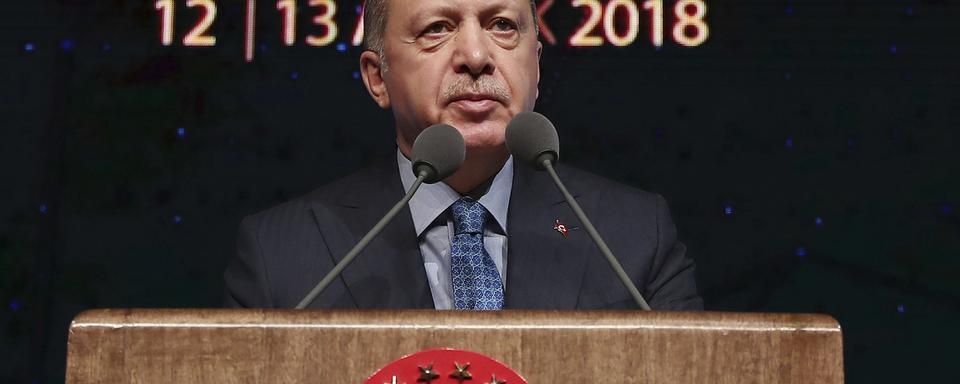 Le président turc Recep Tayyip Erdogan a annoncé mercredi une offensive contre les Kurdes en Syrie. [Presidential Press Service via AP]