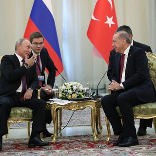 Vladimir Poutine et Recep Tayyip Erdogan, lors d'une rencontre le 7 septembre 2018. [EPA/Turkish presidential/Keystone]