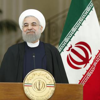 Le président iranien Hassan Rohani a appelé à l'unité. [Keystone - Peter Klaunzer]