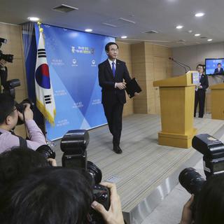 Le ministre sud-coréen de l'Unification Cho Myoung-Gyon lors d'une conférence de presse le 2 janvier. [AP/Keystone]