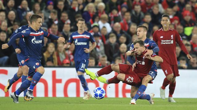 XS malmené au match aller à Anfield contre l'Etoile rouge de Belgrade. [Jon Super]