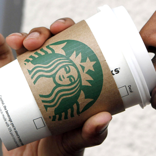 L'accord conclut avec Starbucks ne modifie en rien son programme de rachat d'actions, fait savoir Nestlé. [AP/Keystone - Alan Diaz]