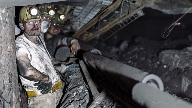 Des ouvriers dans la mine Prosper-Haniel à Bottrop, en Allemagne, le 14 mai 2018. [Keystone - AP Photo/Martin Meissner]