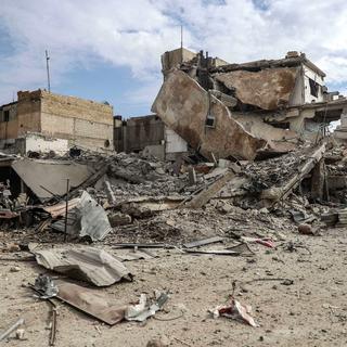 L'état des bâtiments témoigne de la violence des raids du régime syrien sur la Goutha. [EPA/Keystone - Mohammed Badra]