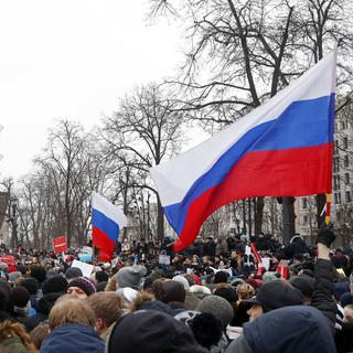 Des opposants à Vladimir Poutine manifestent à Moscou, le 28 janvier 2018. [Keystone - EPA/Sergueï Chirikov]