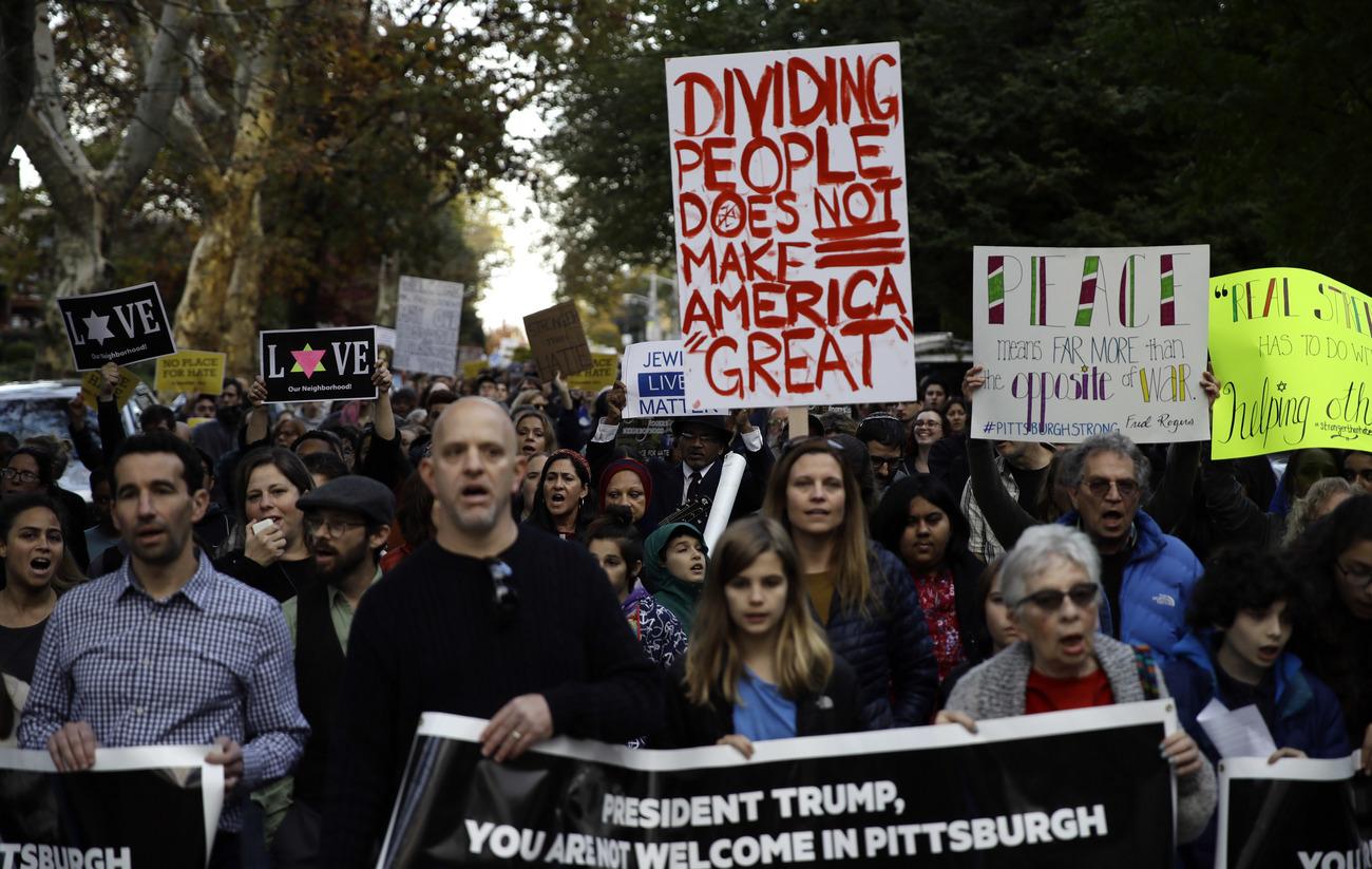 De nombreux manifestants reprochent au président Trump ses discours qui encouragent le racisme. [Keystone - AP Photo/Matt Rourke]