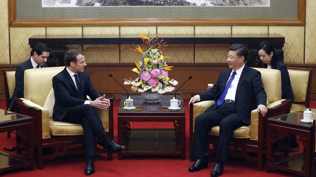 Les présidents français Emmanuel Macron et chinois Xi Jinping se sont rencontrés le 8 janvier 2018. [Keystone - Andy Wong]