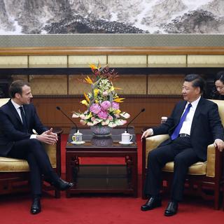 Les présidents français Emmanuel Macron et chinois Xi Jinping se sont rencontrés le 8 janvier 2018. [Keystone - Andy Wong]