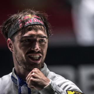 Le Suisse Max Heinzer après sa victoire face à l'Italien Santarelli, 26.07.2018. [EPA/Keystone - Aleksandar Plavevski]