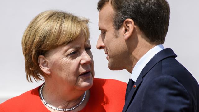 Angela Merkel et Emmanuel Macron à Meseberg, 19.06.2018. [EPA/Keystone - Christian Bruna]