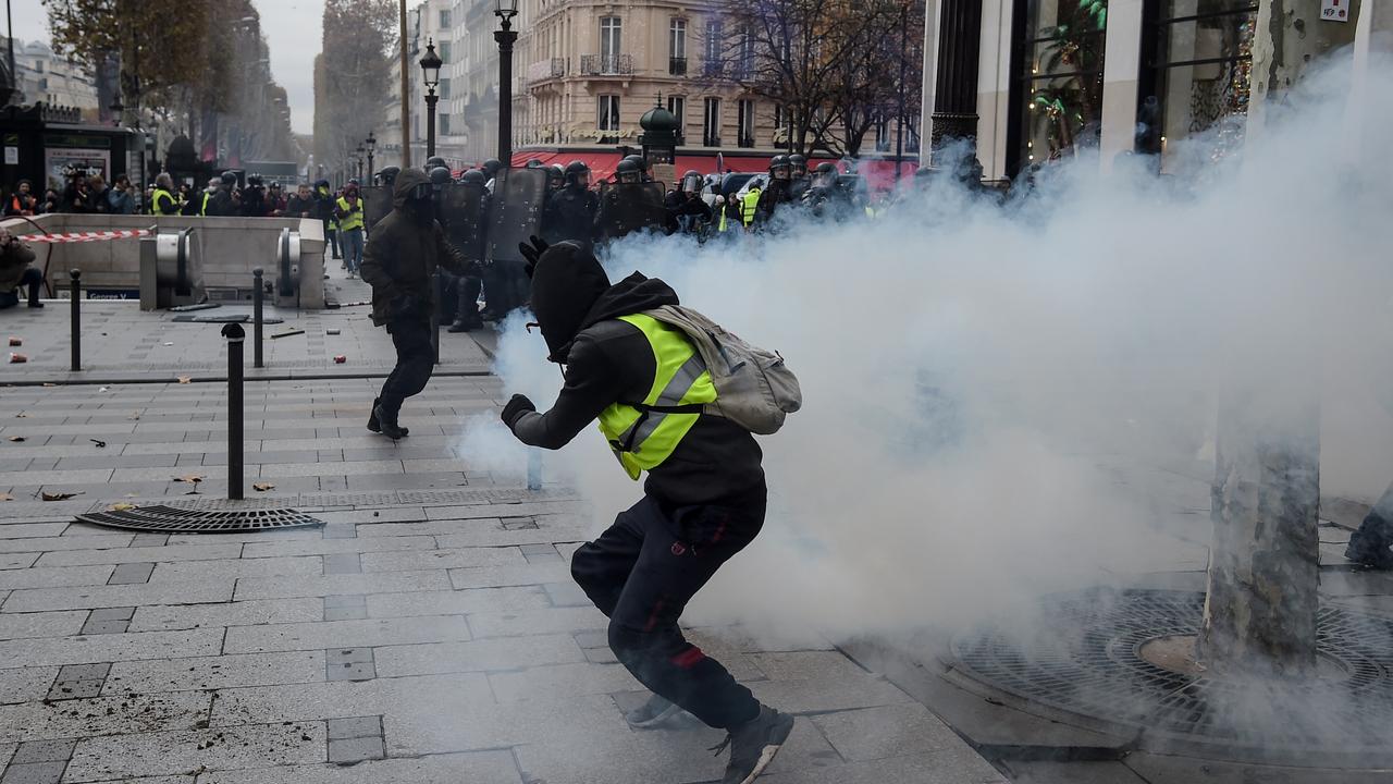 Le mouvement des "gilets jaunes" en France est comparé en Russie aux "révolutions de couleur". [AFP - Lucas Barioulet]