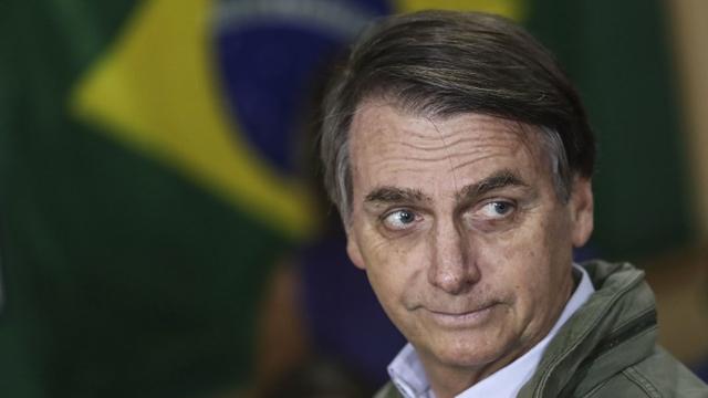 Le président Jair Bolsonaro va retirer le Brésil du Pacte mondial sur les migrations de l'ONU. [AFP - Ricardo Moraes]