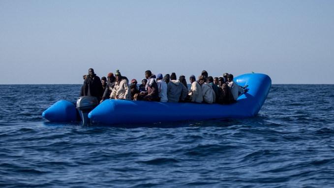 Des migrants à bord d'un bateau le 19 janvier 2019 (image d'illustration). [AFP - Federico Scoppa]