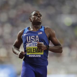 Le coureur américain Christian Coleman lors des 100 mètres homme des championnats d'athlétisme au Quatar [AP Photo/Keystone - Petr David Josek]