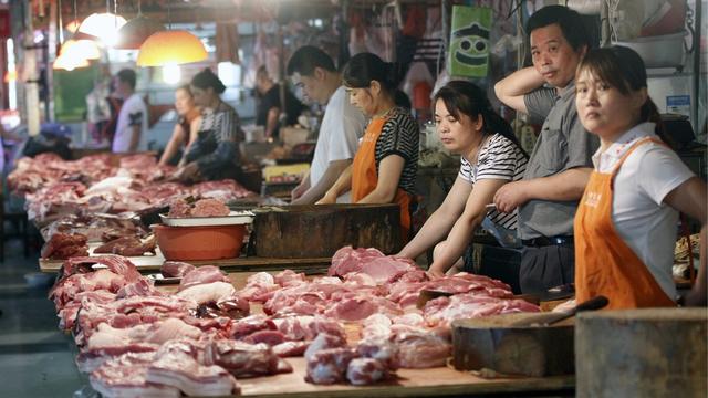 En Chine, la peste porcine inquiète. [Keystone - Dong Jinlin]