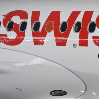 Un Airbus A220 de la compagnie aérienne Swiss en juin 2015. [Keystone - Walter Bieri]
