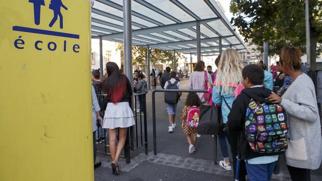 Les élèves genevois reprennent les cours lundi prochain. [Keystone - Salvatore Di Nolfi]